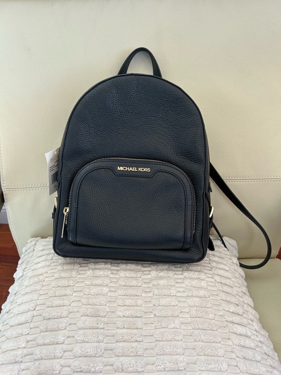 Michael Kors Handbags - Michael Kors Black Pebbled Leather Mini Backpack with Gold Hardware